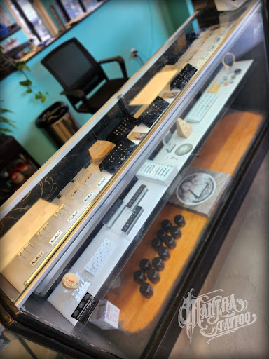 Explore lion chest tattoo ideas, creative tattoo ideas in Denver, available at Mantra Tattoo and Piercing