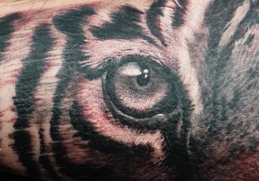 Explore black belt tattoo ideas, creative tattoo ideas in Oxnard, available at Downtown Tattoo & Body Piercing