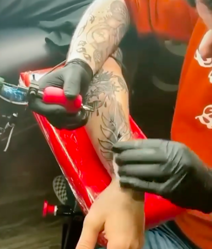 Explore flower finger tattoo ideas, creative tattoo ideas in Austin, available at Sacrament Tattoo & Gallery