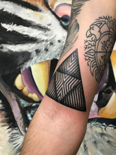 Explore upper arm tattoo ideas for women, creative tattoo ideas in Saint Petersburg, available at Buku Tattoo Studio