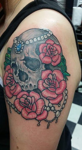 Explore hawaiian tattoo ideas for men, creative tattoo ideas in Bristol, available at Black Sparrow Tattoo Studio