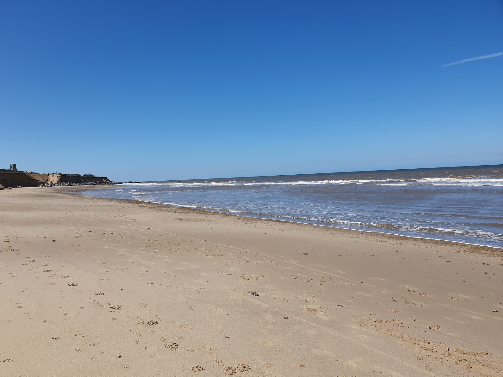 Foto van Happisburgh Strand gelegen in een natuurlijk gebied