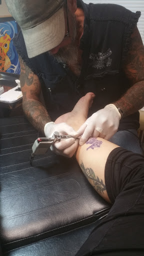 Explore family of four tattoo ideas, creative tattoo ideas in Elkhart, available at Liquid Ink 2 Tattoos & Body Piercings