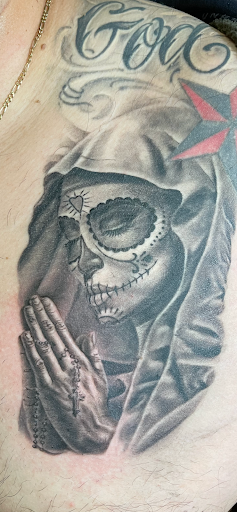 Explore throat tattoo ideas, creative tattoo ideas in Seaside, available at Creative Visions Ink Tattoo & Body Piercing Studio - Call for Appointment