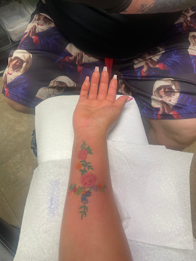 Explore horizontal tattoo ideas, creative tattoo ideas in Raleigh, available at Rock N Roll Tattoo & Piercing