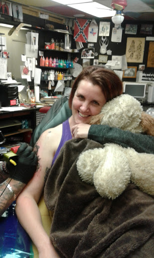 Explore guitarist tattoo ideas, creative tattoo ideas in Longview, available at Fugis Tattoo Shop