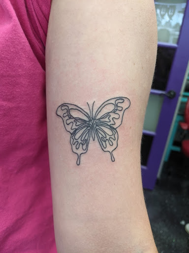 Explore coca cola tattoo ideas, creative tattoo ideas in Slippery Rock, available at Dinky Dachshund Tattoo Parlor