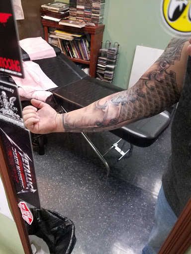 Explore death metal tattoo ideas, creative tattoo ideas in Wilkes Barre, available at Marcs Tattooing