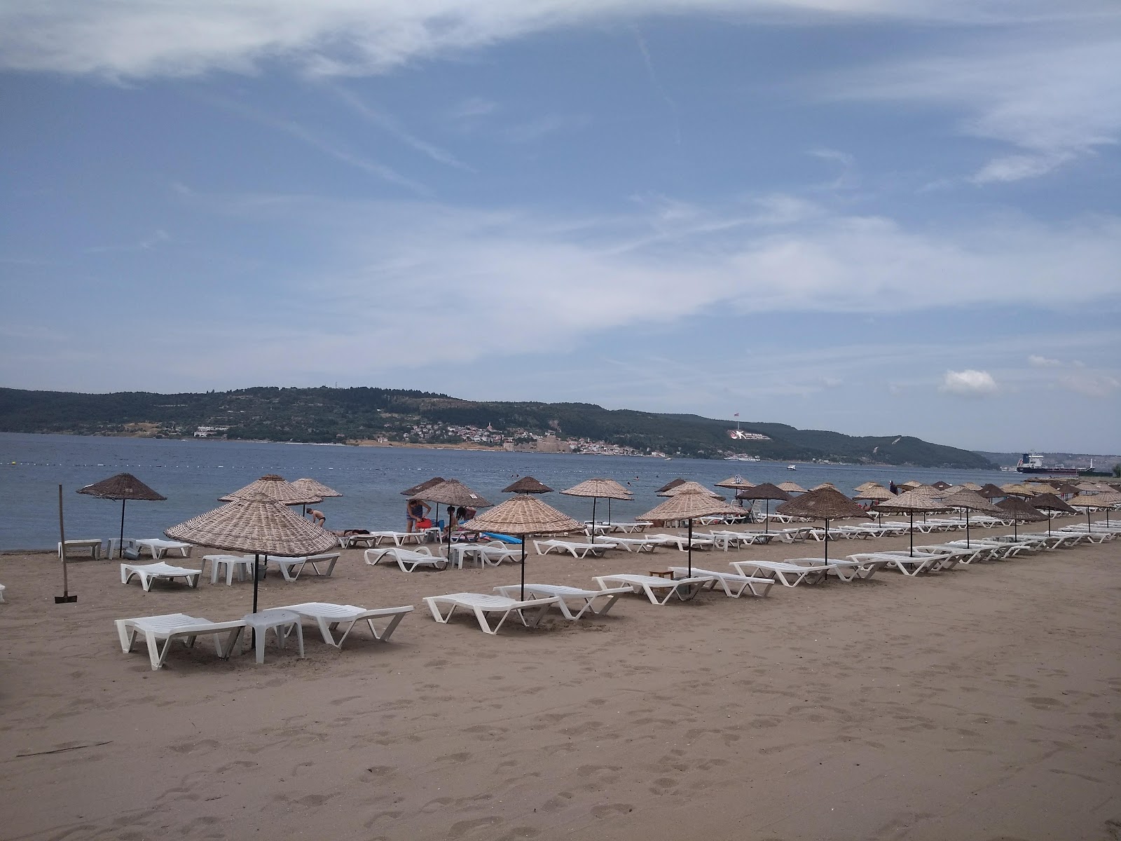 Φωτογραφία του DSI beach με φωτεινή άμμος επιφάνεια