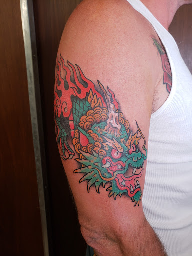 Explore small crow tattoo ideas, creative tattoo ideas in Des Moines, available at Iron Heart Tattoo