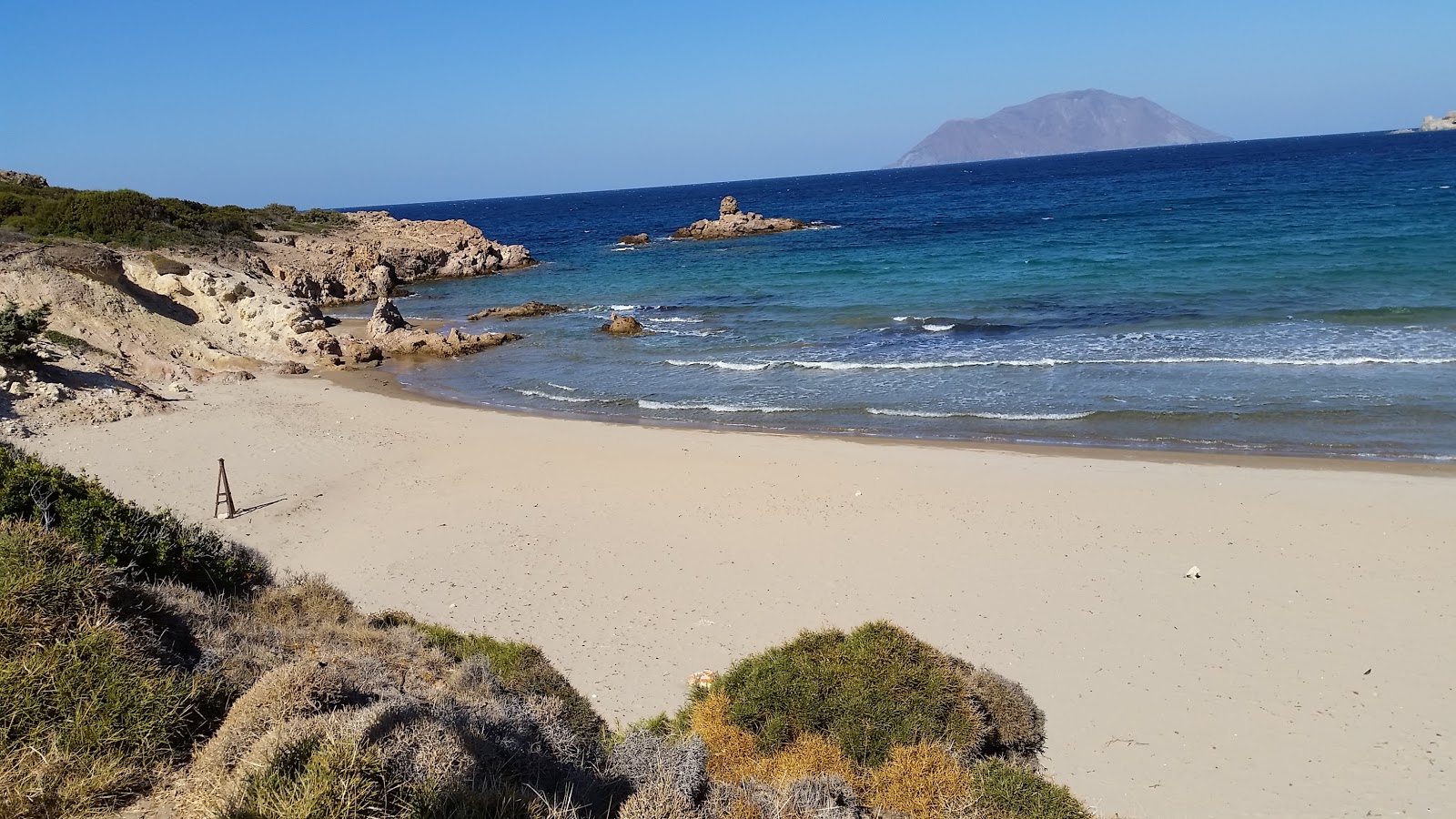 Foto di Ammoudaraki beach con una superficie del sabbia marrone
