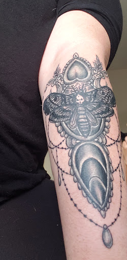 Explore island tattoo ideas, creative tattoo ideas in Anderson, available at FearlessTattoos and Piercing