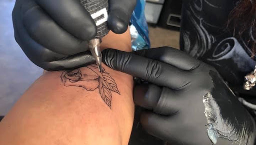 Explore flower tattoo ideas for men, creative tattoo ideas in Moweaqua, available at Fleshwound Tattoo