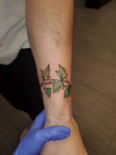 Explore enso tattoo ideas, creative tattoo ideas in Palm Harbor, available at Angry Owl Tattoo and Piercing