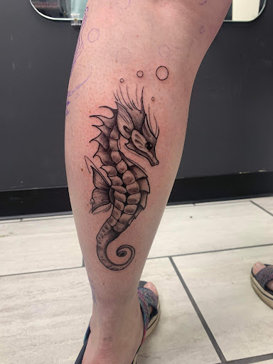 Explore lifeguard tattoo ideas, creative tattoo ideas in Cadillac, available at Limitless Ink Tattoo Studio