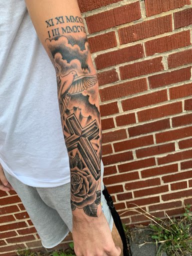 Explore quetzalcoatl tattoo ideas, creative tattoo ideas in Strasburg, available at Champion Tattoo Company