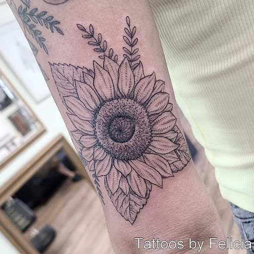 Explore tattoo ideas for mens, creative tattoo ideas in Fort Myers, available at Tiger Lotus Tattoo and Piercing