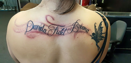 Explore 2 sons tattoo ideas, creative tattoo ideas in Houston, available at 3rd Coast Custom Tattoos & Body Piercings Studio
