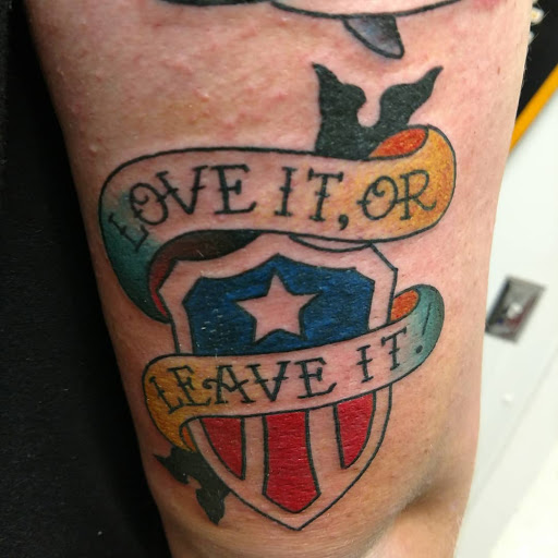 Explore rose thigh tattoo ideas, creative tattoo ideas in Marietta, available at Monkeys Uncle Tattoo