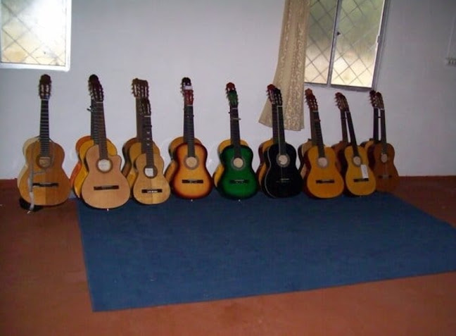 Escuela De Guitarra Prof. Damian Rey - San José de Mayo