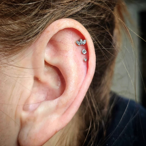 Explore five finger death punch tattoo ideas, creative tattoo ideas in Greeley, available at Bombshell Body Works LLC Tattoo & Piercing Studio in Greeley, CO