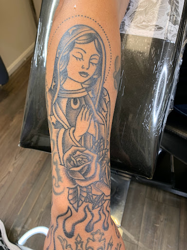 Explore blue line tattoo ideas, creative tattoo ideas in Fall River, available at Indelible Ink Tattoo Studio 2.0