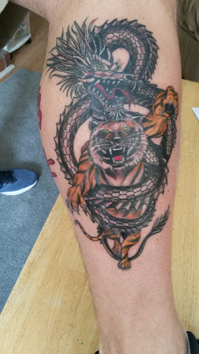 Explore mom and dad tattoo ideas, creative tattoo ideas in Wake Forest, available at Revelation Ink Tattoo and Piercing