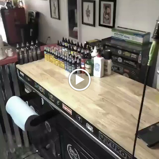 Explore wedding band tattoo ideas for him, creative tattoo ideas in Clarkston, available at Rogue Tattoo