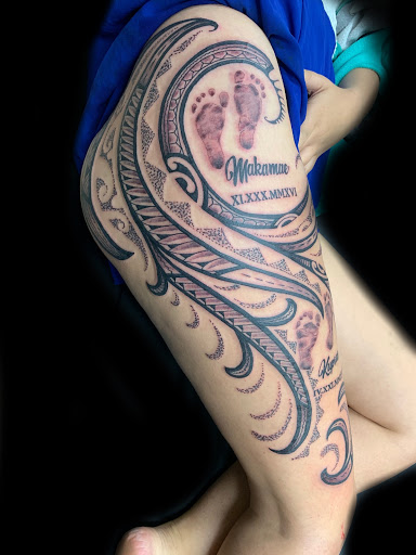 Explore tattoo ideas for women's lower back, creative tattoo ideas in Hilo, available at Native Flesh Tattoo