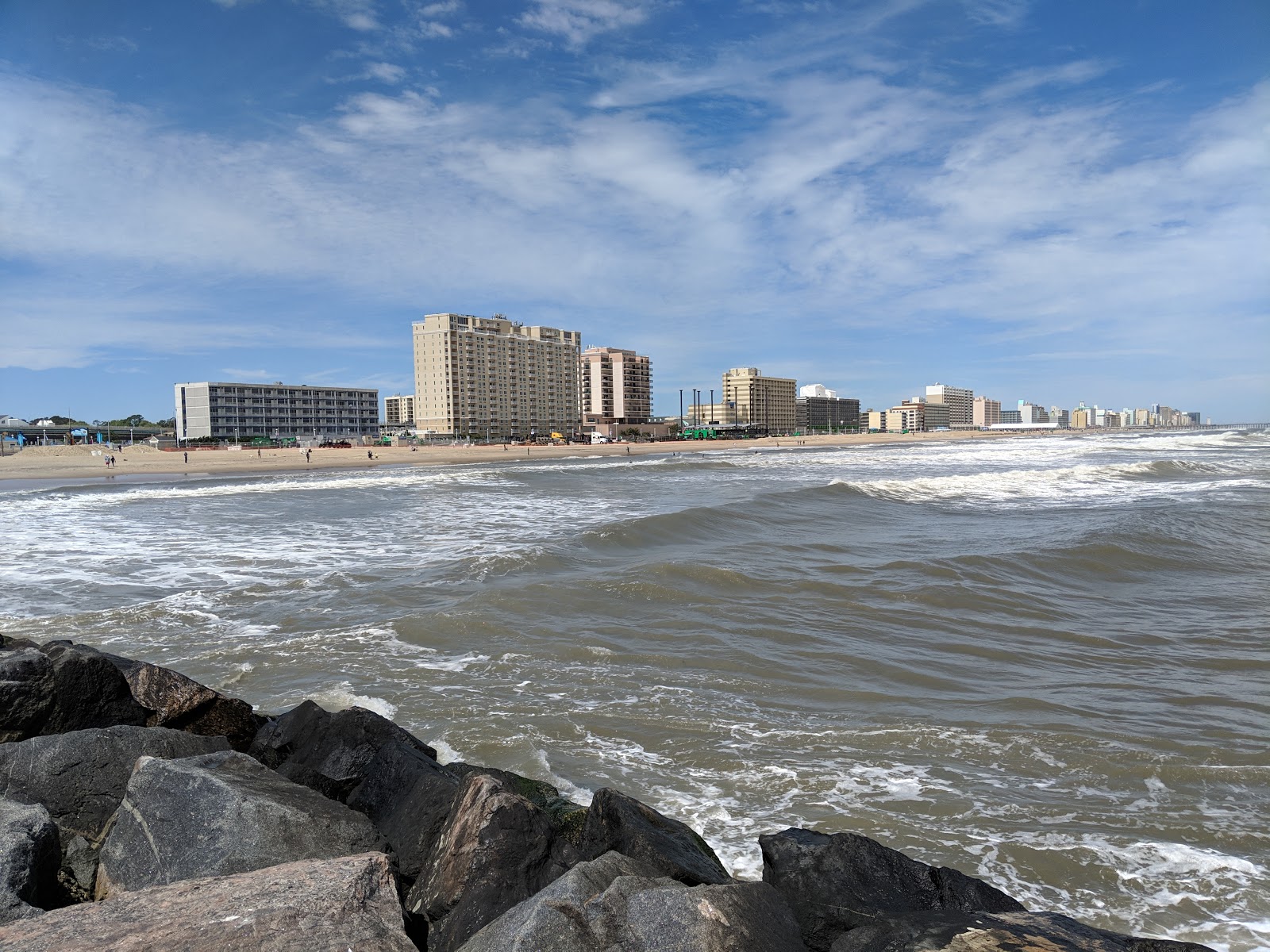 Photo of Grommet Island beach with long straight shore