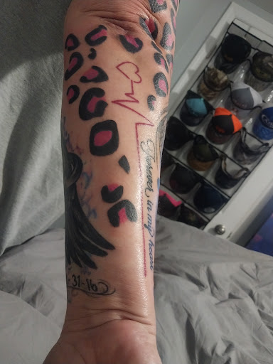 Explore easy flower tattoo ideas, creative tattoo ideas in Zephyrhills, available at Lions Den Tattoo Company