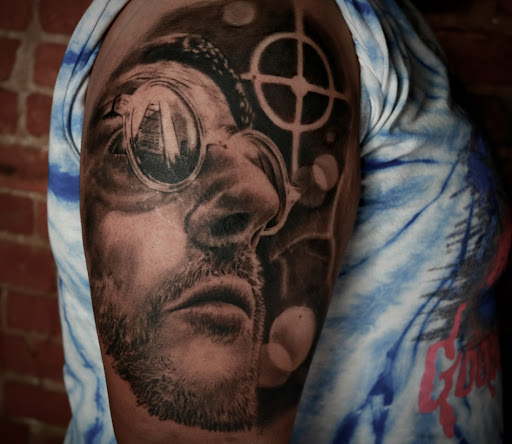 Explore dog sleeve tattoo ideas, creative tattoo ideas in Washington, available at Trilogy Atelier - DC Tattoo Shop Piercing Studio