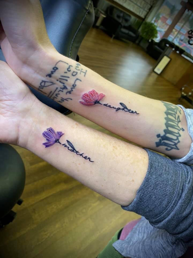 Explore song lyric tattoo ideas, creative tattoo ideas in The Dalles, available at Cascade Tattoo Company (Hanks Family Tattoo)