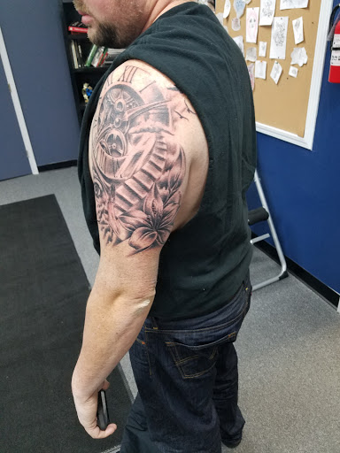 Tattoo Shop «Next Level Tattoo Company - Imlay City», reviews and photos, 420 E 3rd St, Imlay City, MI 48444, USA