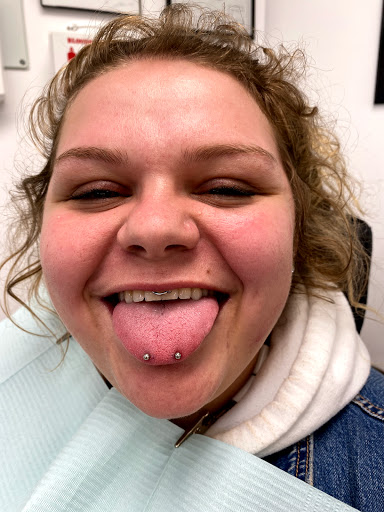 Explore script tattoo ideas for men, creative tattoo ideas in Myrtle Beach, available at Professional Body Piercing by Jackie