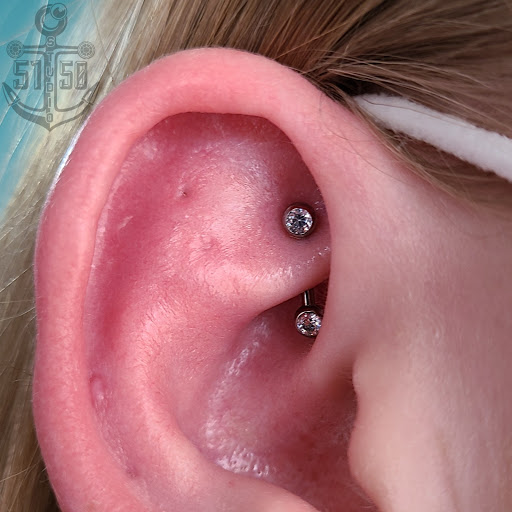 Explore tattoo wrist cover up ideas, creative tattoo ideas in Kearney, available at Studio 5150 Piercing & Fine Jewelry