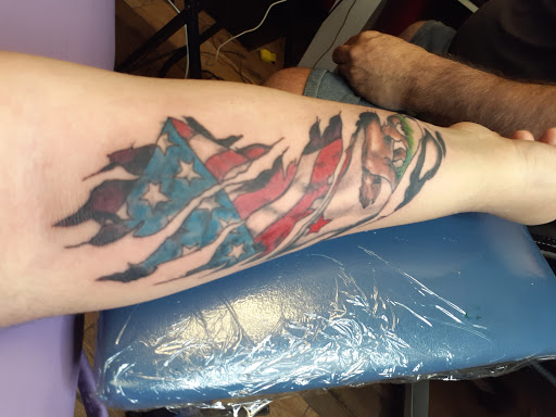 Explore tattoo ideas female thigh, creative tattoo ideas in Albuquerque, available at A Touch of Ink Tattoo & Art Gallery