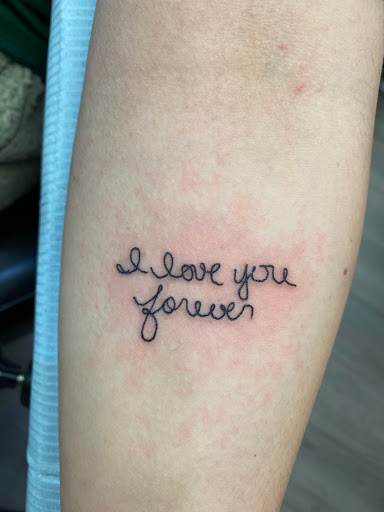 Explore forearm rose tattoo ideas, creative tattoo ideas in Kenosha, available at Kenosha Tattoo Company