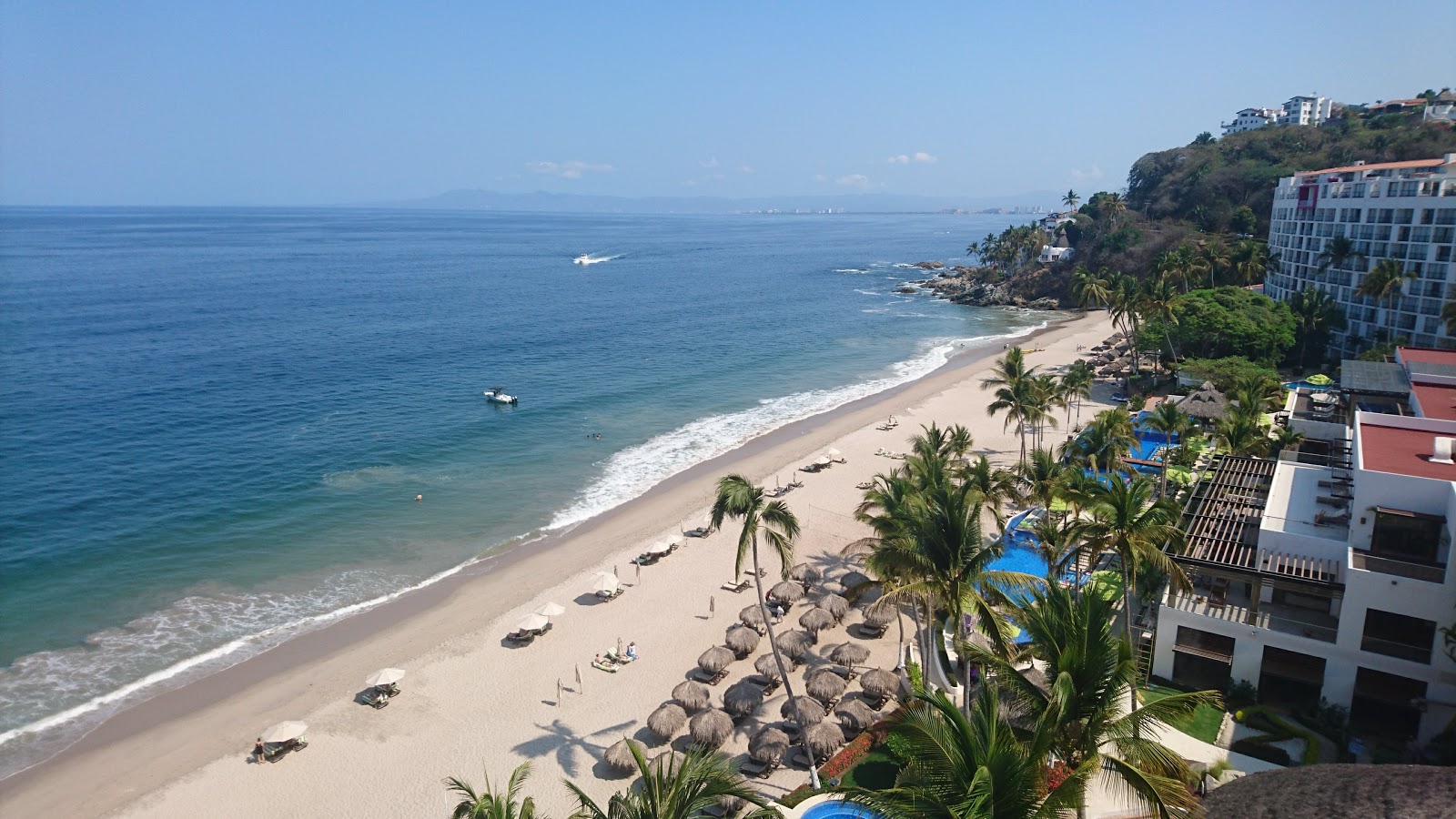 Las Estacas beach的照片 带有碧绿色纯水表面
