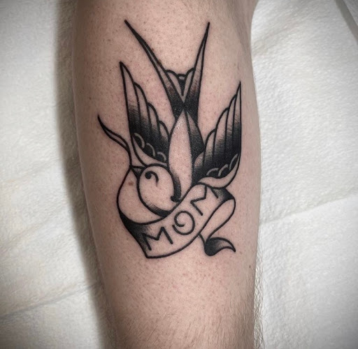 Explore squid tattoo ideas, creative tattoo ideas in New Orleans, available at TOUGH LOVE TATTOOS