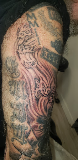 Explore mens tattoo ideas chest, creative tattoo ideas in Toledo, available at Artistik Tat2 and Body Piercing