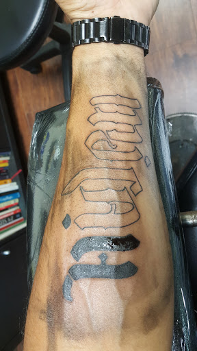 Explore microphone tattoo ideas, creative tattoo ideas in Littleton, available at Living Canvas Tattoo and Piercing