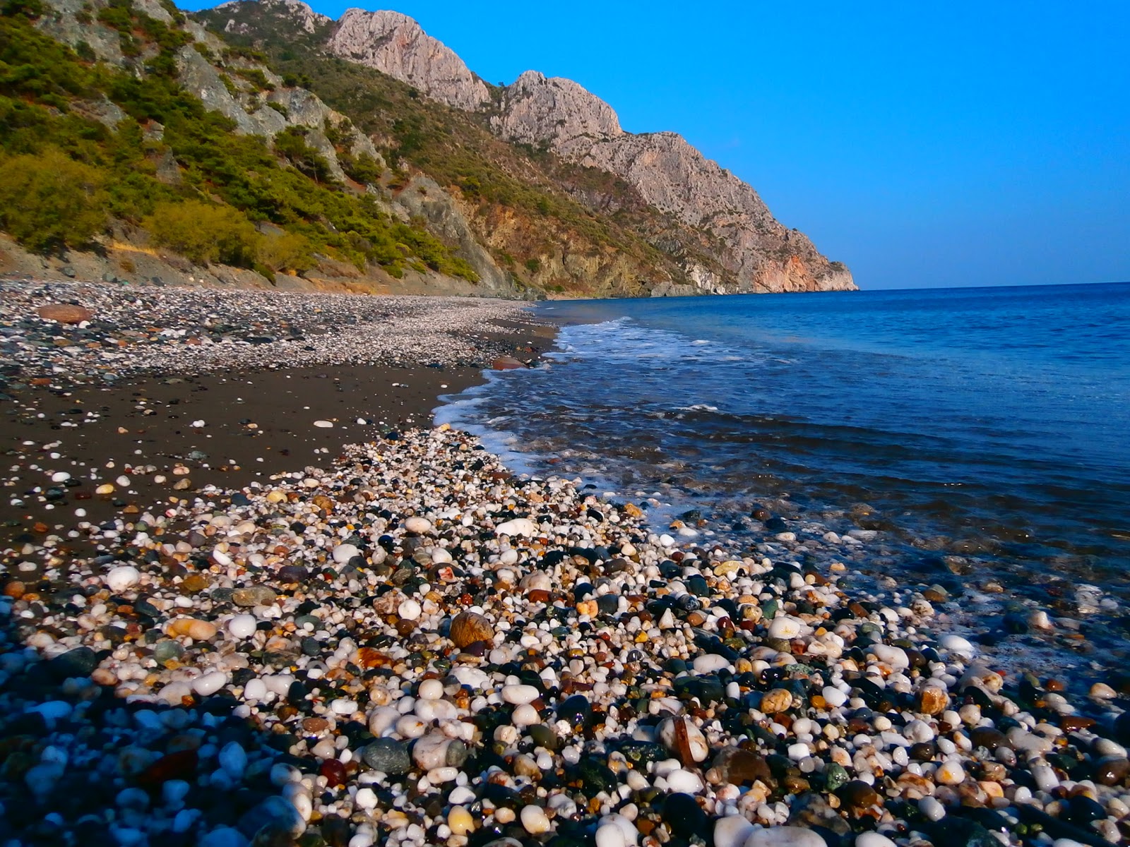 Photo of Drotas beach with turquoise pure water surface