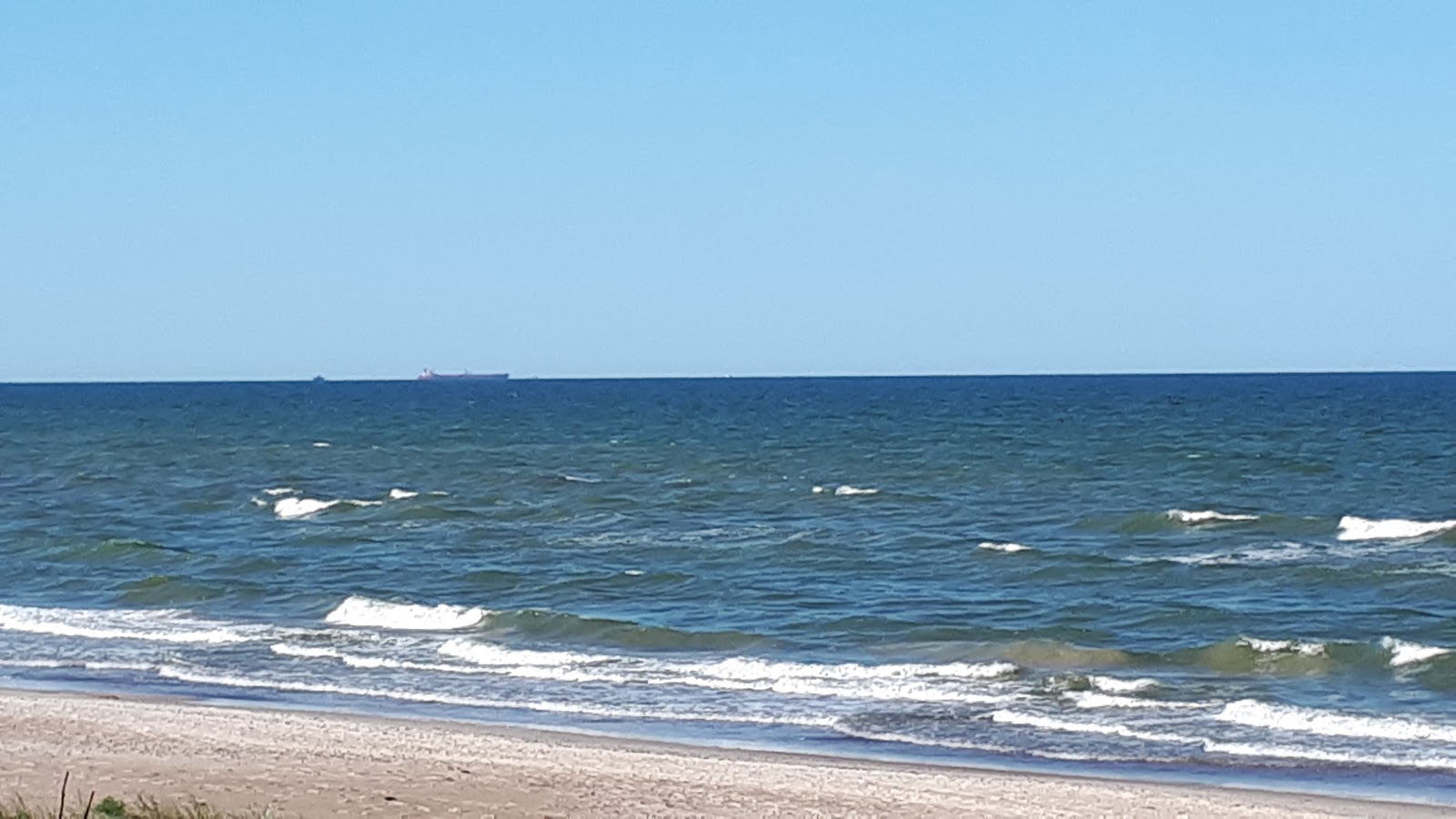 Fotografija Aulaukio Baltija z svetel pesek površino