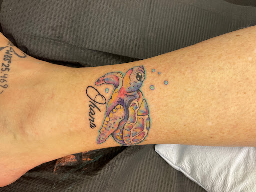 Explore grandson tattoo ideas for grandma, creative tattoo ideas in Daytona Beach, available at Studio 21 Tattoo & Piercings Daytona Beach
