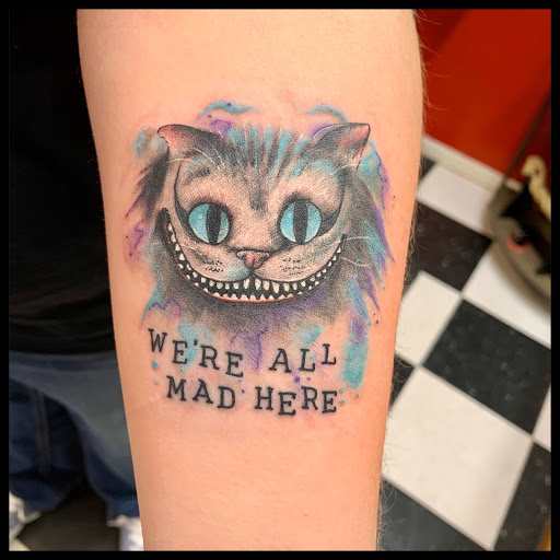 Find good leg tattoo ideas for your next unique tattoo in Louisville at Wizink Tattoos