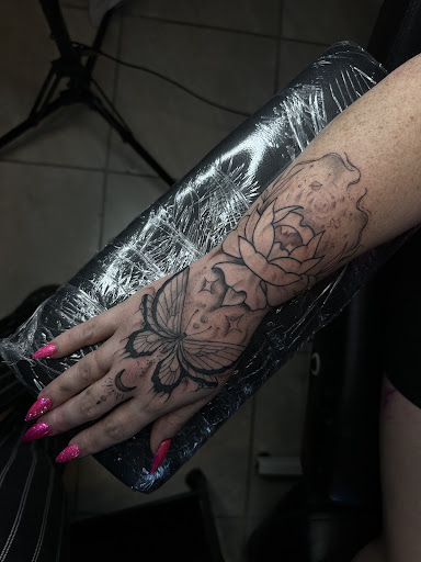 Explore women's leg tattoo ideas, creative tattoo ideas in Zephyrhills, available at The Tattoo Haven