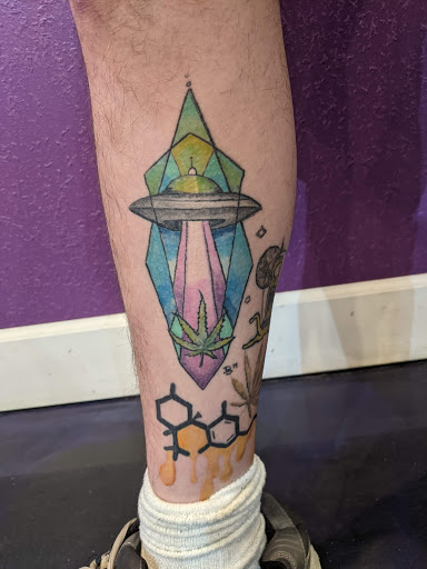 Explore tattoo ideas for behind the ear, creative tattoo ideas in Denver, available at Nocturnal Tattoo