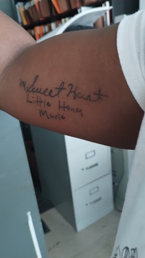 Find low back tattoo ideas for your next unique tattoo in Ringgold at Royal Cobra Tattoo