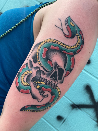 Explore tribal dragon tattoo ideas, creative tattoo ideas in Metairie, available at Galactic Tattoo Studio